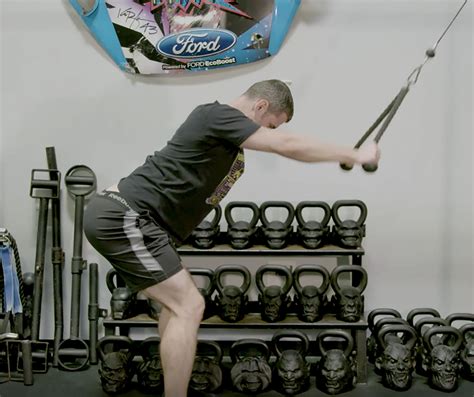 Instructions: How To This is an isolation exercise that primarily targets your back. Pulling the bar down in an arc with your arms straight helps to remove muscle groups like biceps …